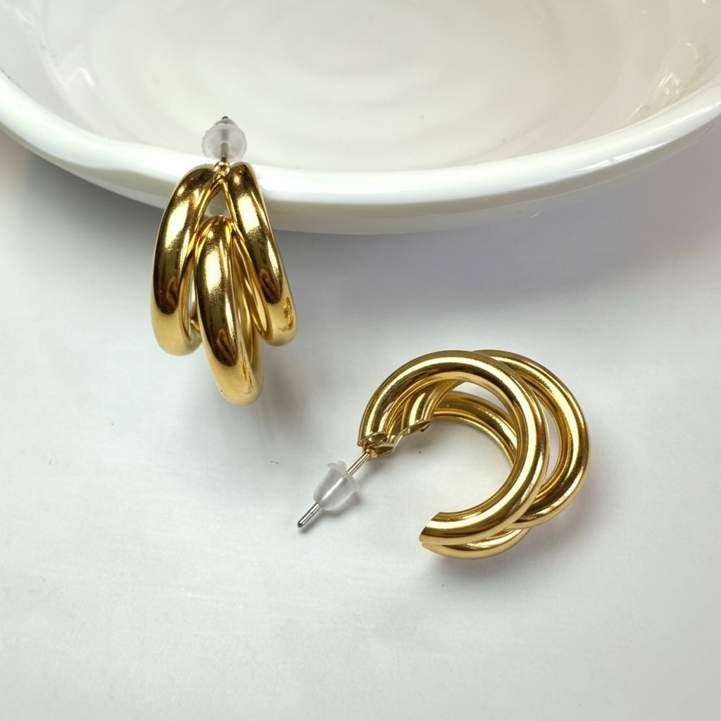 Orecchini Triple oro