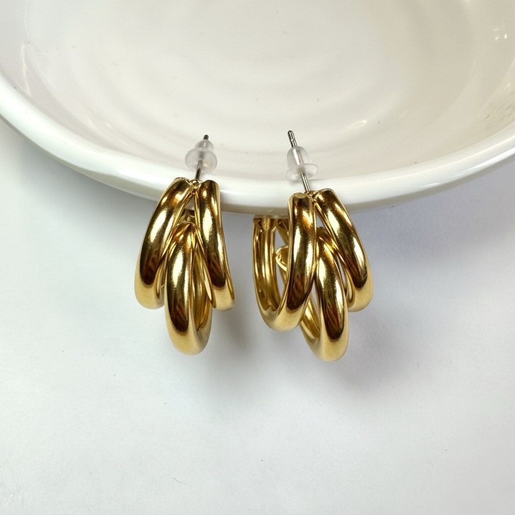 Orecchini Triple oro