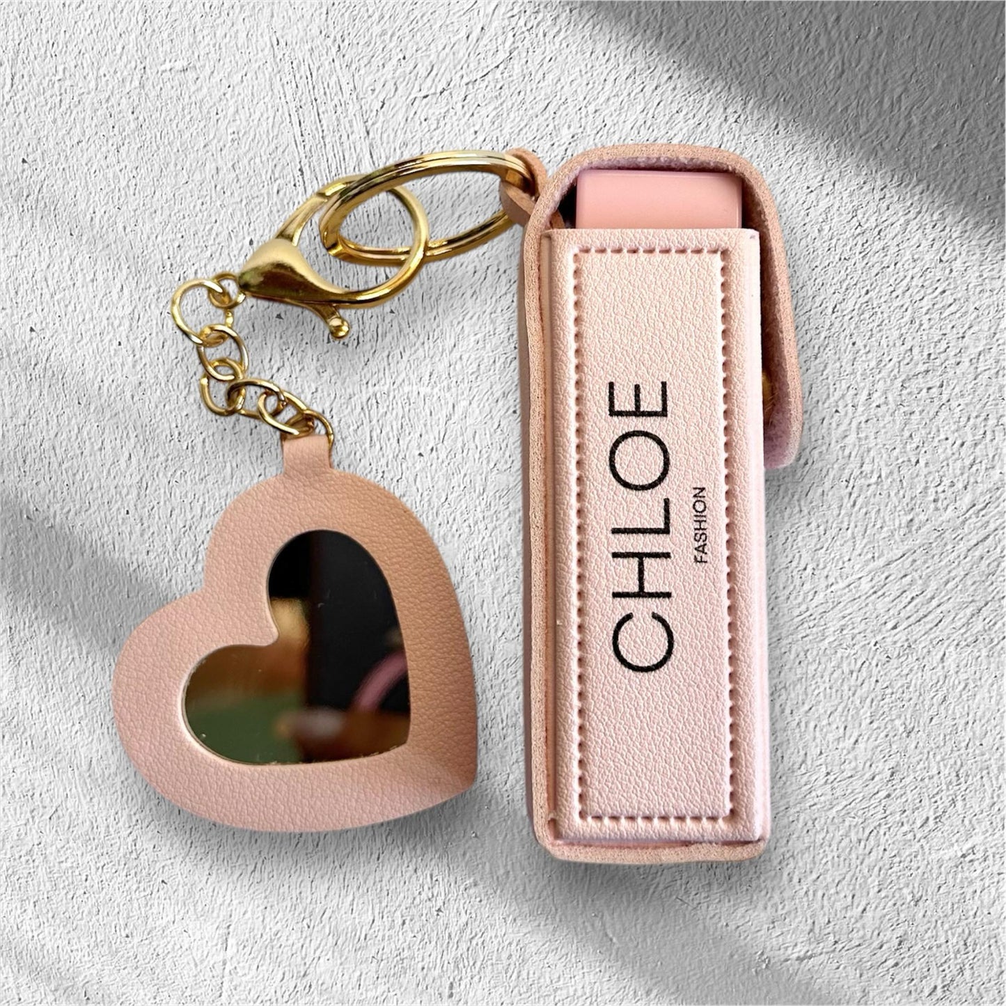 Lippenöl mit Schlüsselanhänger-Etui und Erdbeerspiegel